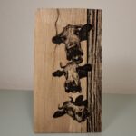 3 Vaches gravées sur bois